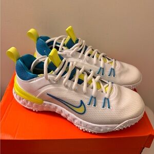 Nike Huarache 9 Elite TF Women’s White and Blue Sneakers with Yellow Highlights